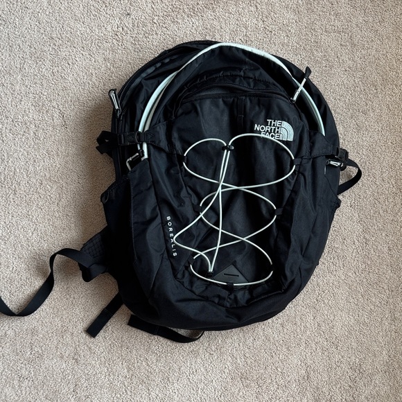 The North Face Handbags - The North Face Black Backpack with White Bungee